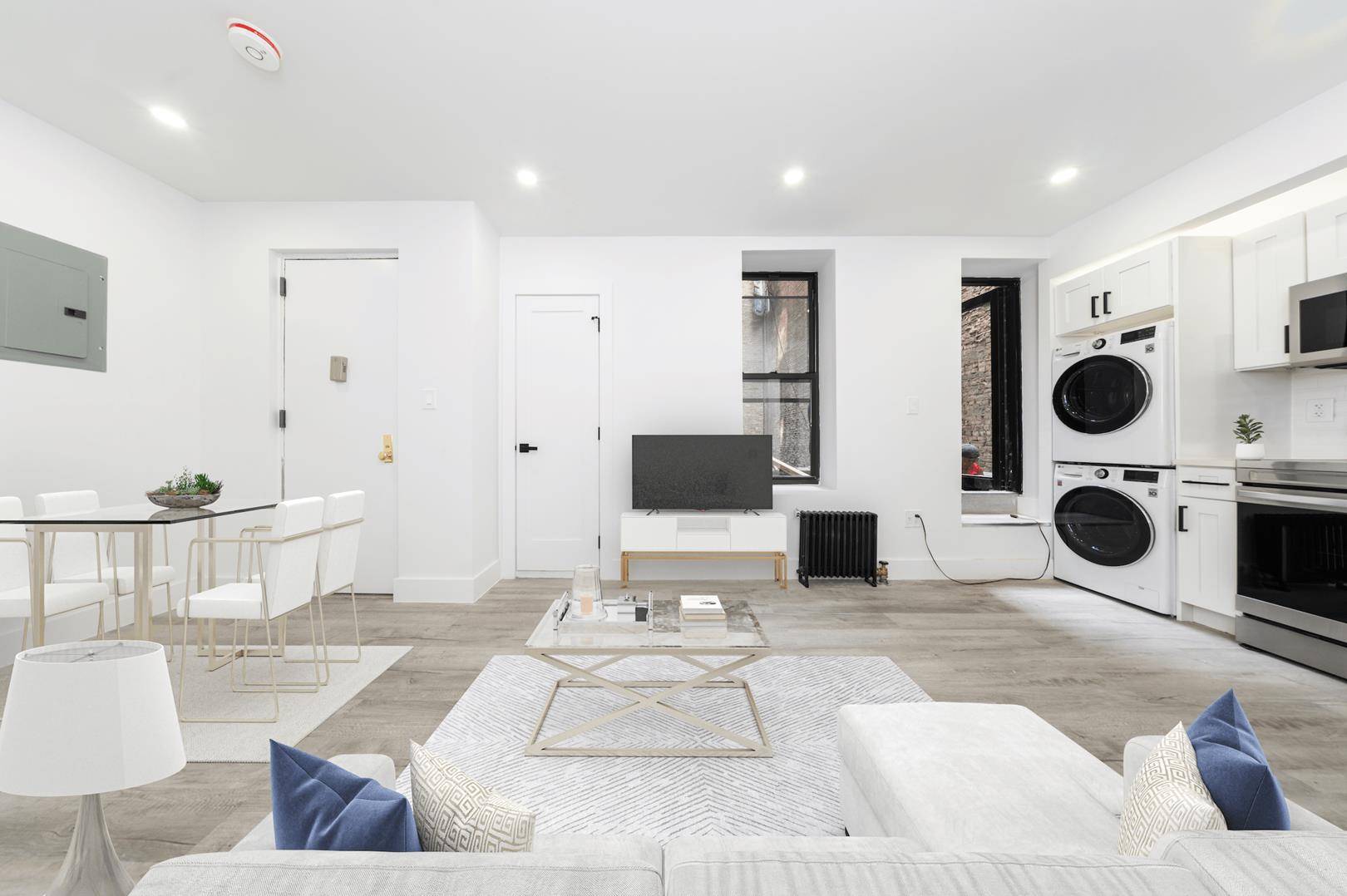 Live in this newly renovated 3 bedroom 2 bath apartment that is complete with wide grain, matte finish hardwood floors, in unit washer dryer, and a private patio !