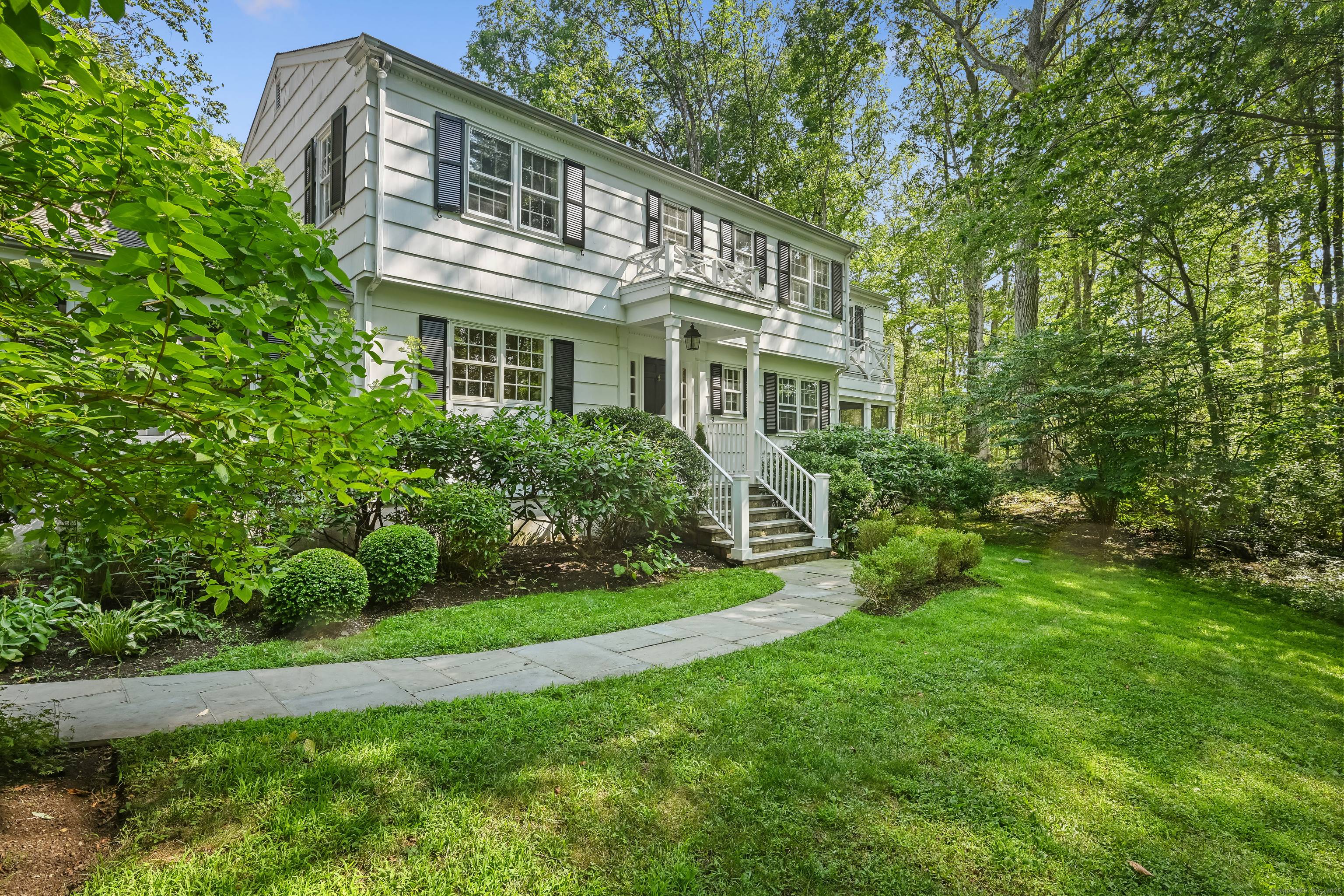 This beautifully maintained classic Connecticut Colonial blends timeless charm with modern updates throughout.