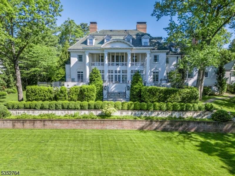 MASTERFULLY RESTORED HOME ON OVER AN ACRE, LESS THAN A MILE FROM DOWNTOWN SUMMIT !