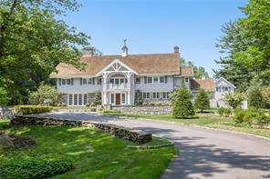 Exquisite gated estate sited down a long driveway on private mid country lane with impeccably renovated 5 bedroom main house, guest house, pool pavilion and exceptional grounds.