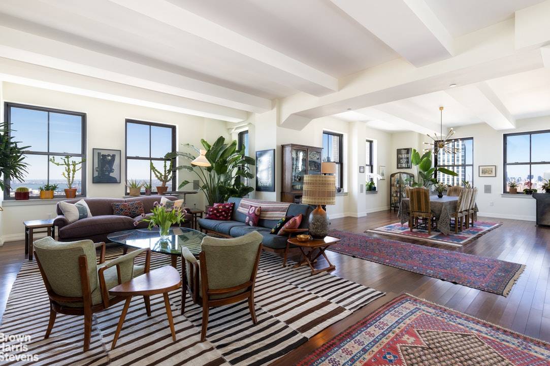 Motivated sellers ! Seventeen oversized windows provide 270 of spectacular views ; including the Verrazano Bridge, Lady Liberty and the Empire State Building, from this sun filled, luxurious apartment.