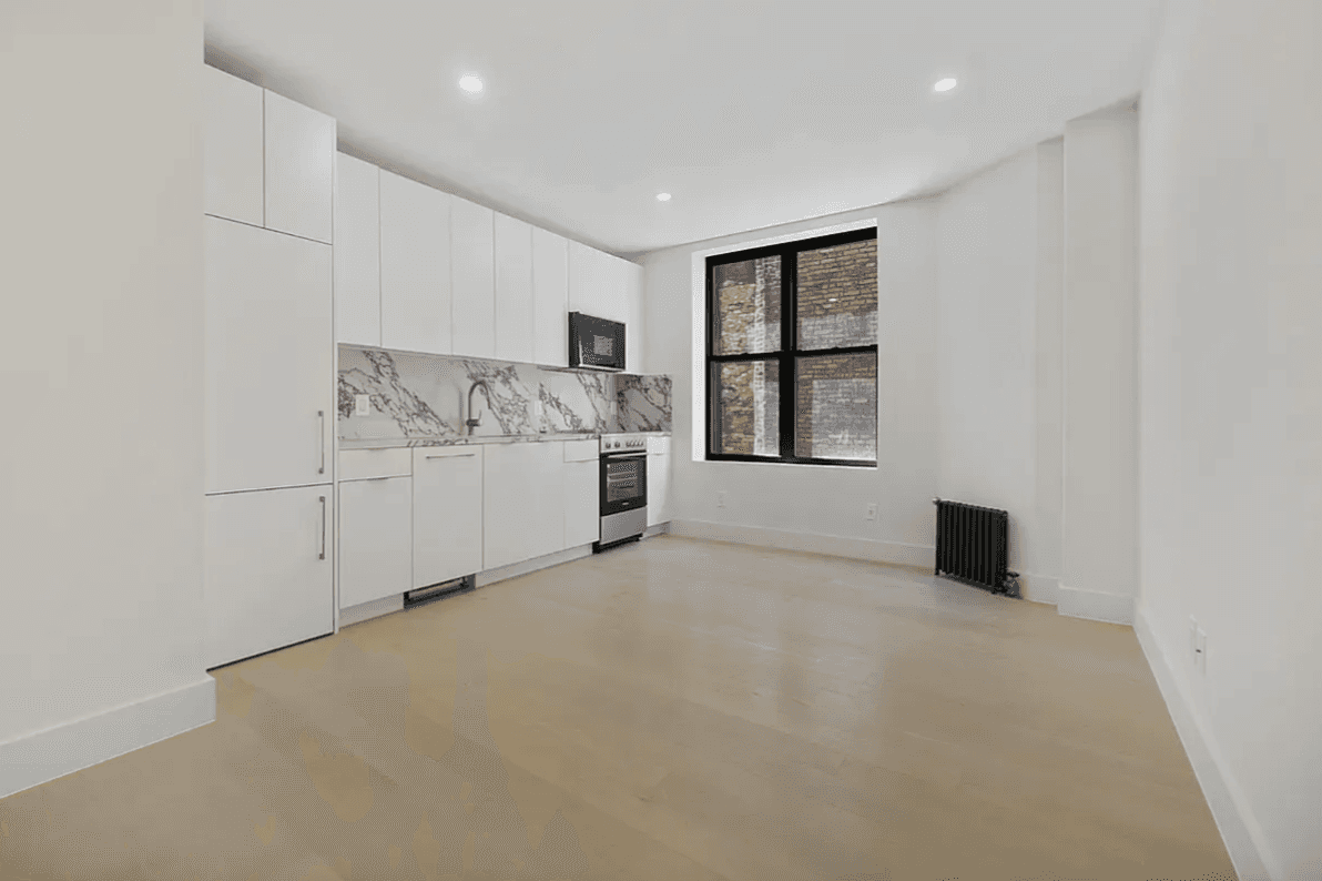 Beautifully gut renovated 3 bedroom, 1 bath residence featuring a stunning large kitchen with stainless steel appliances, wide plank Oak flooring, spacious bedrooms and in unit washer dryer.