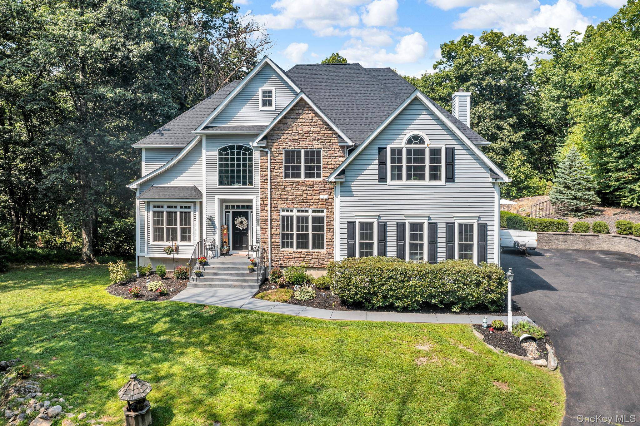 Welcome to 97 Shagbark Lane, a stunning multi family colonial nestled on 3.