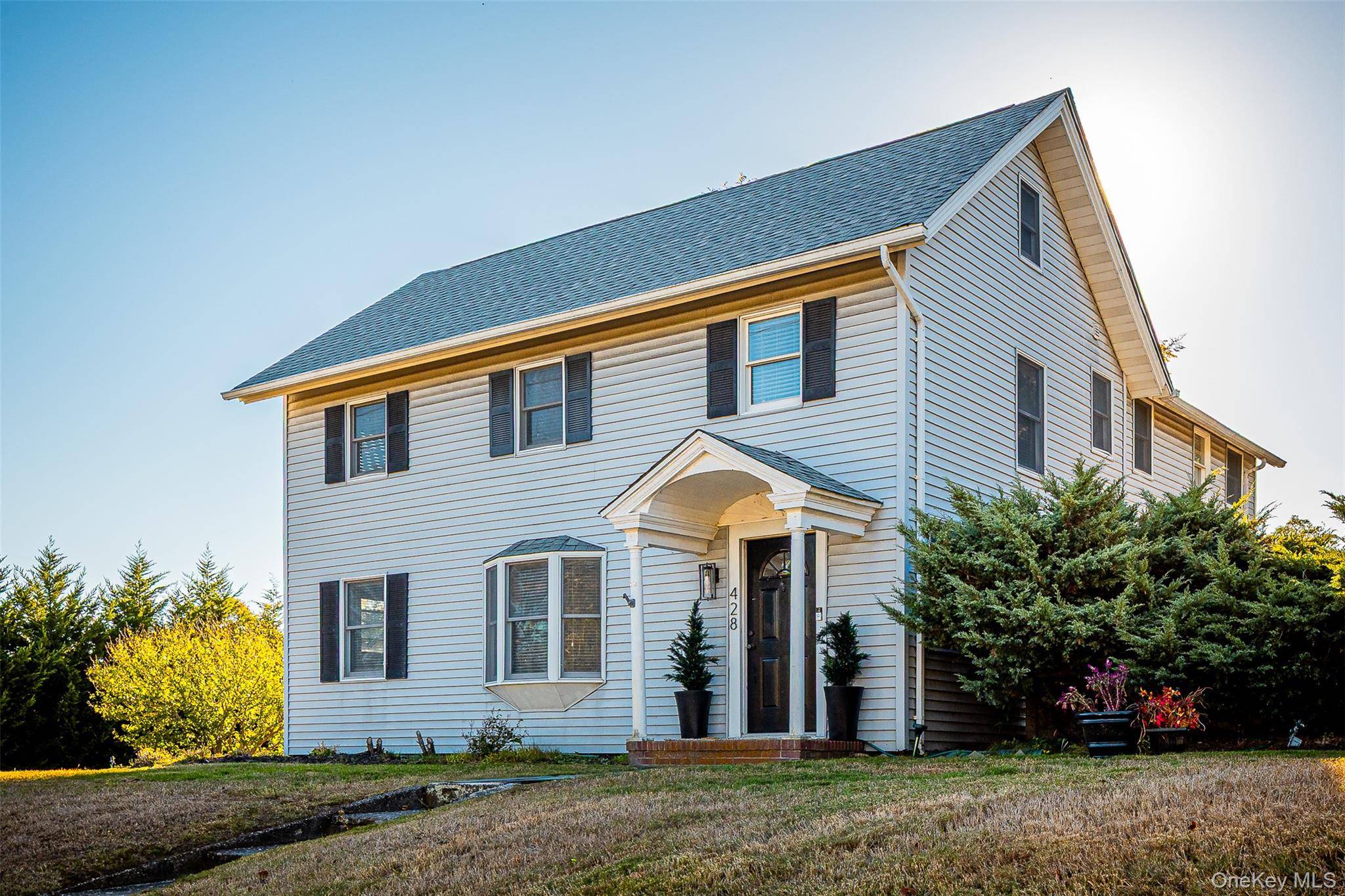 Historic Colonial Estate with Cottage located in the heart of East Moriches MAIN Street Historic District.