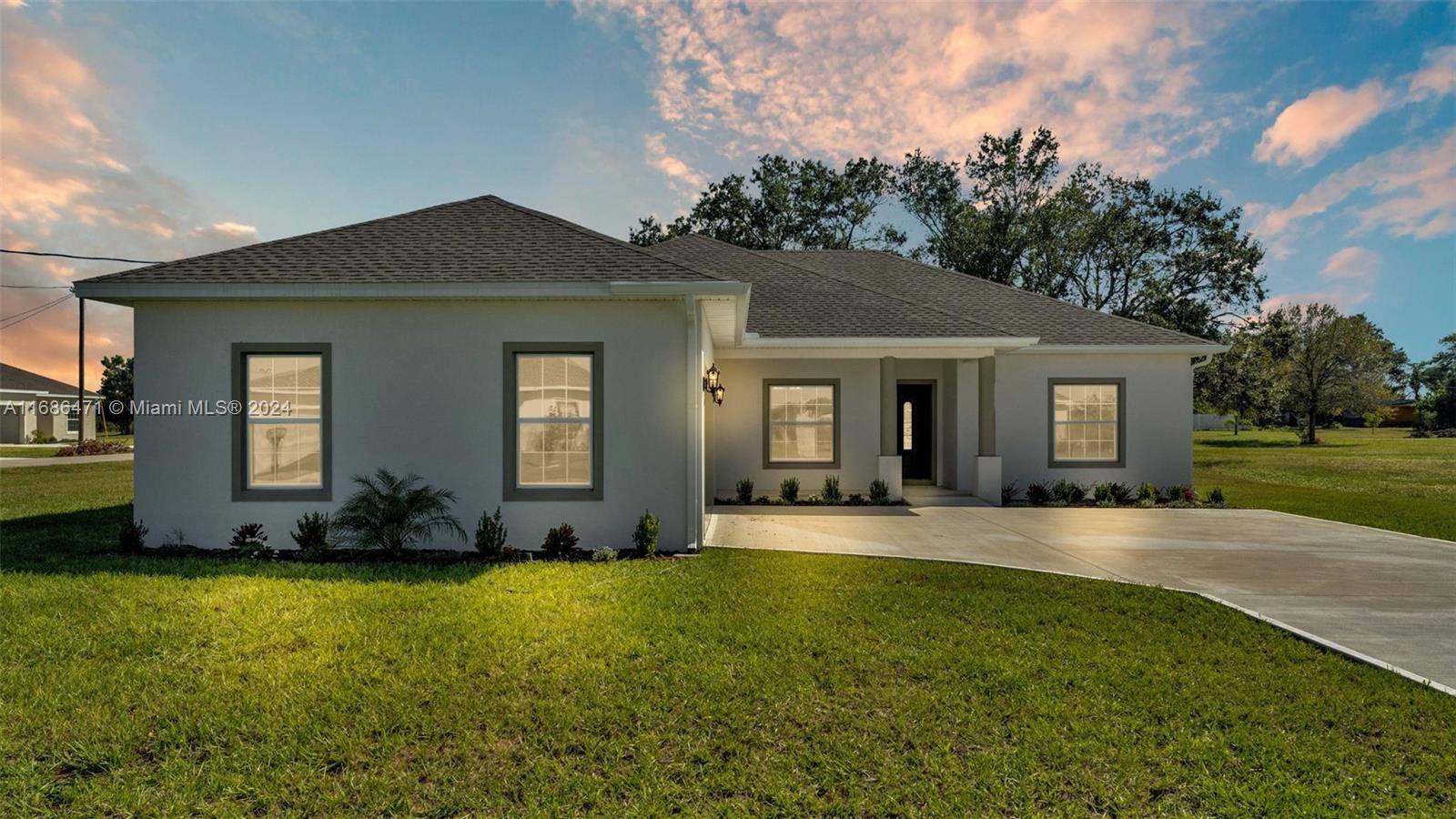 Discover this stunning new construction custom home built in Avon Park's latest development !