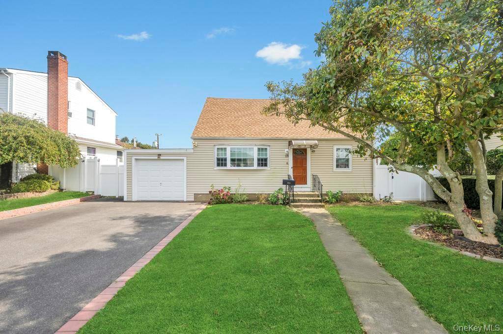 Beautifully Updated 3 Bedroom, 2 Bath Expanded Cape with Low Taxes !