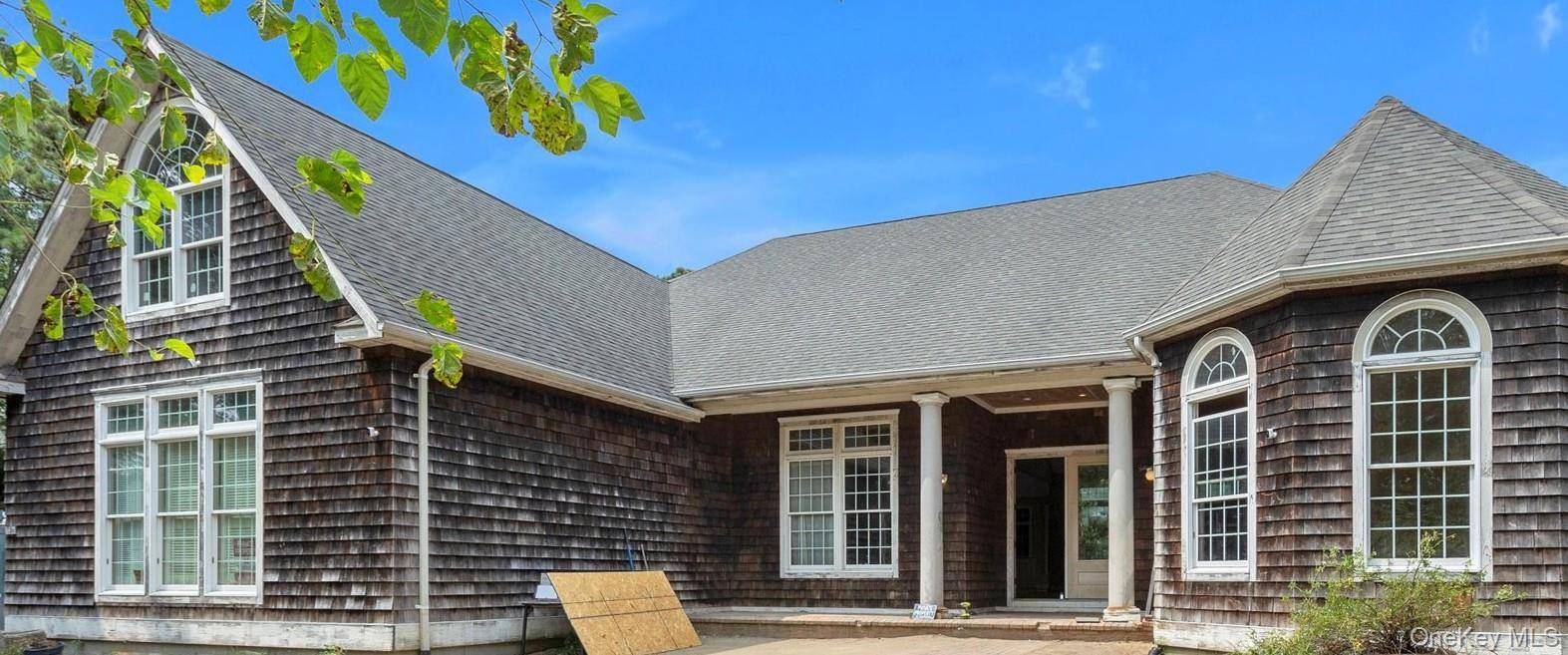 Nestled on a private wooded lot just shy of a full acre in the Southampton Pines section of East Quogue is where you'll find 138 Maggie Drive, a sprawling 4 ...