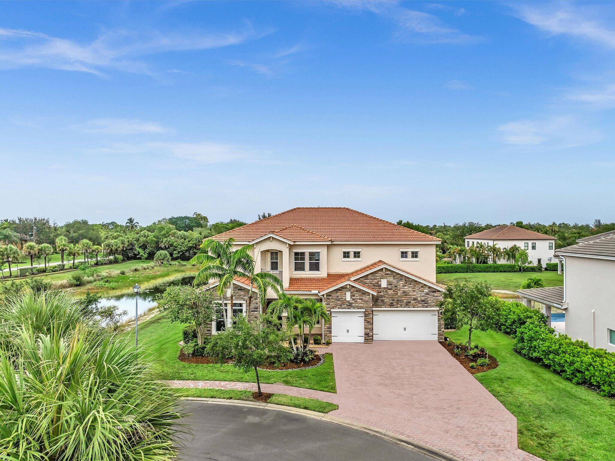 Elevate your lifestyle in this breathtaking estate, boasting nearly 5000 square feet of living space on an exclusive 19 home community.