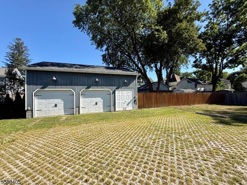 VINTAGE 3 STORY 2 FAMILY HOME THAT FEATURES 8 BEDROOMS, 4 FULL BATHROOMS AND 3 LEVELS OF LIVING SPACE PLUS A FULL BASEMENT FOR ADDED STORAGE.