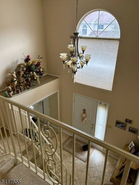 Lovely well maintained townhome with a two story entry.