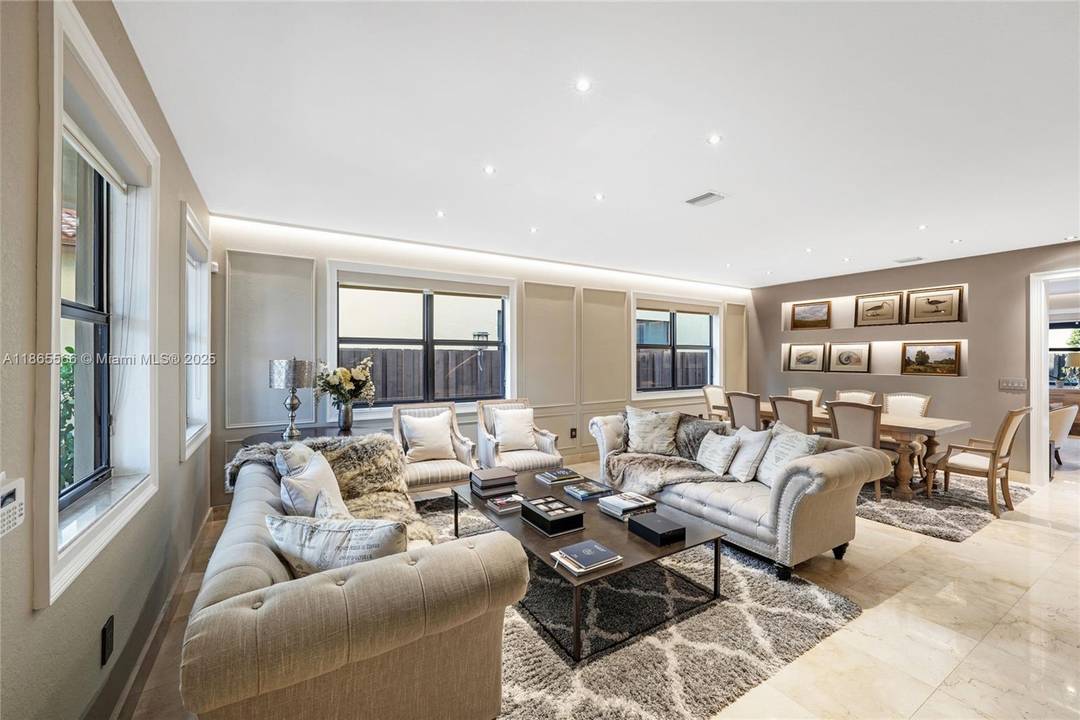 Welcome to this charming and meticulously maintained family home on the heart of Doral.