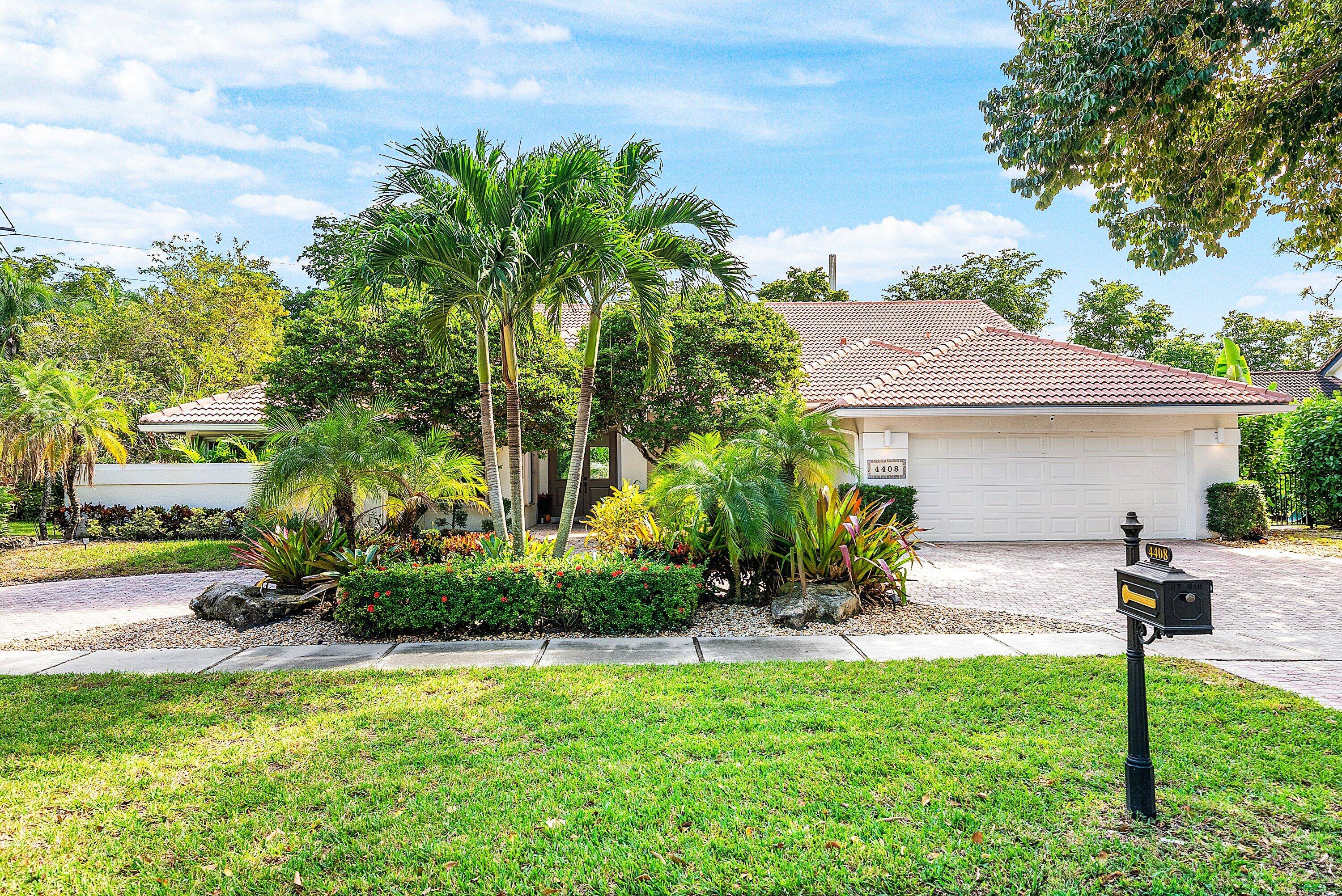 Set within Boca Raton's iconic Woodfield Hunt Club with no required country club membership this beautifully updated 5 bedroom, 3 bath residence blends luxury, comfort, and privacy.
