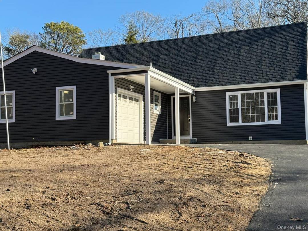 Welcome to this expansive, fully renovated Cape in the heart of Shirley !