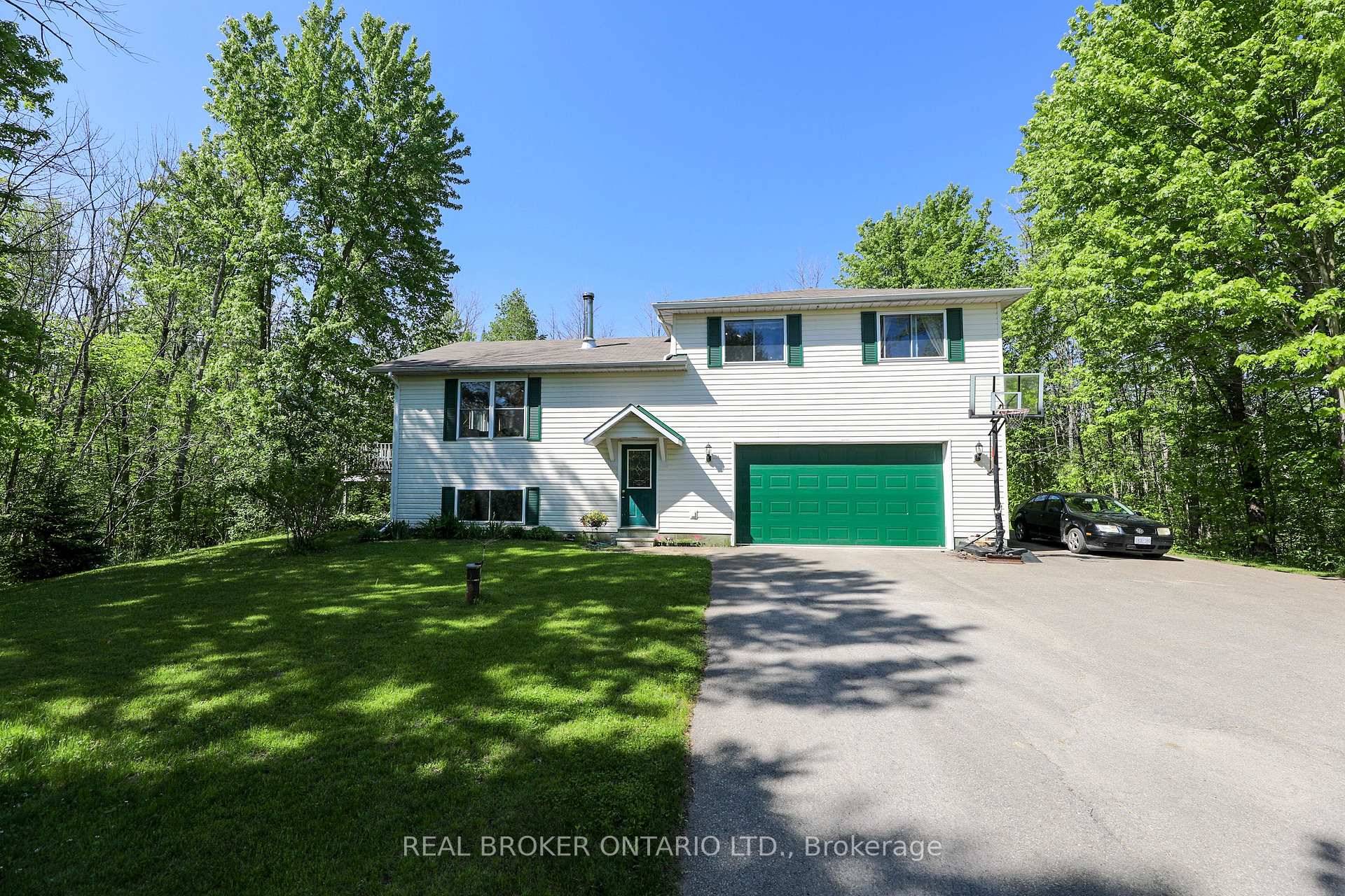 Welcome to this lovingly maintained split level home nestled on a spacious and private lot in peaceful Oxford Station.