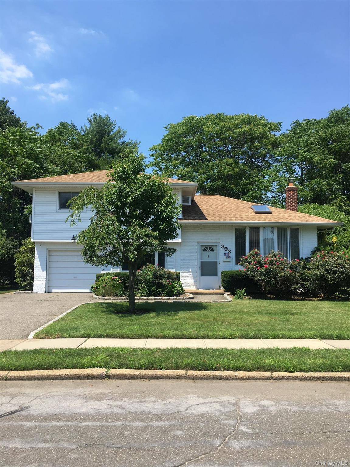 Beautiful split style home featuring 3 spacious bedrooms and 2 full bathrooms, located in the highly sought after Jericho School District.