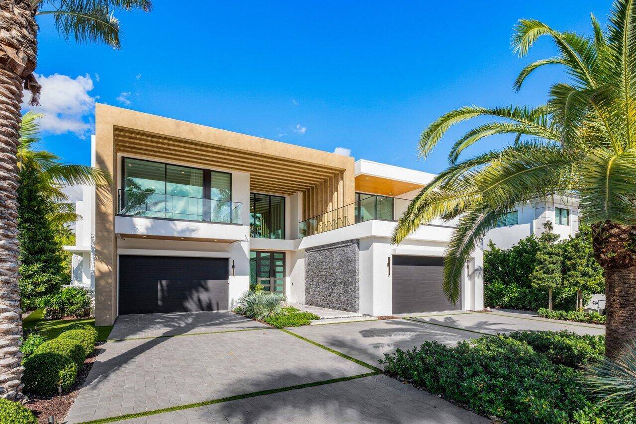 217 Thatch Palm Dr, Brand New Exquisite Contemporary Golf Course Estate sits 6th 7th hole located in the world renowned Royal Palm Yacht CC.