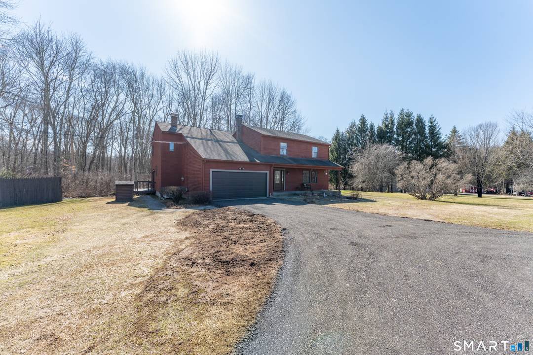Oversized Colonial offering exceptional space, flexibility, and income potential.