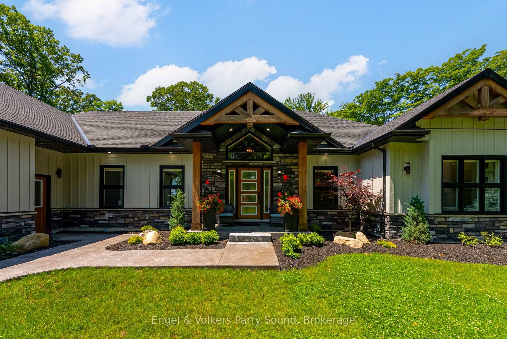 Welcome to 15 Carling Cove, where refined living meets natural beauty.