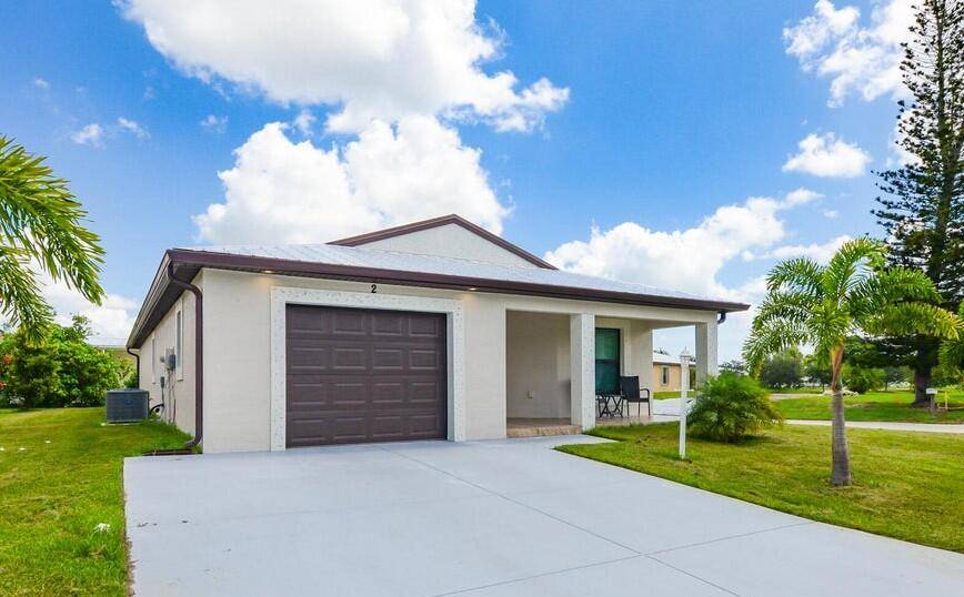Welcome to this beautifully maintained 2022 CBS home located in a desirable 55 community corner lot.
