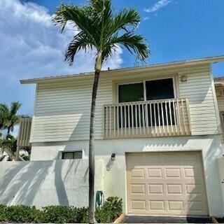 Welcome to this exceptional townhome nestled in the charming community of Tropic Isle.
