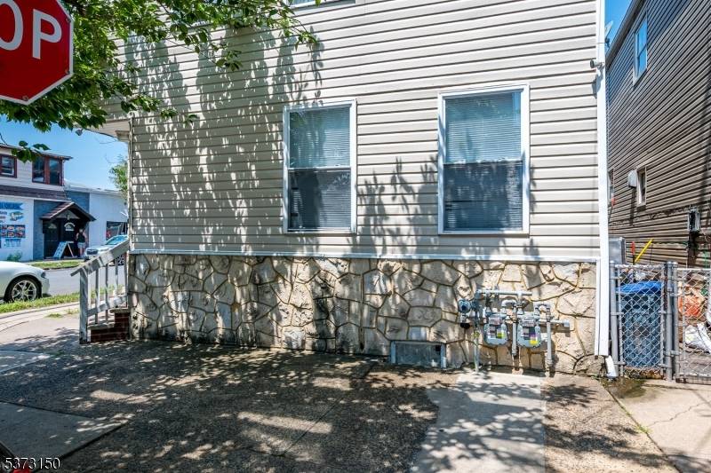 Turnkey 2 unit property with a detached one 1 car garage perfectly situated on a corner lot.