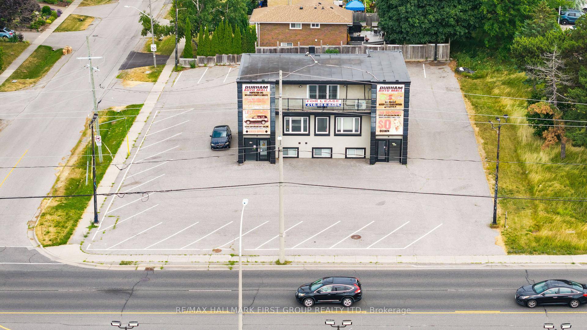 USED CAR DEALERSHIP, OMVIC Approved on Corner Lot with 3 story commercial structure, two spacious apartments and a professionally designed office floor, 3, 400 sq ft interior space on three ...