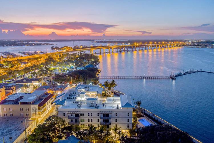 Enjoy Florida living at its finest in this stunning, brand new, fully furnished top floor corner unit at Sailfish Cove !