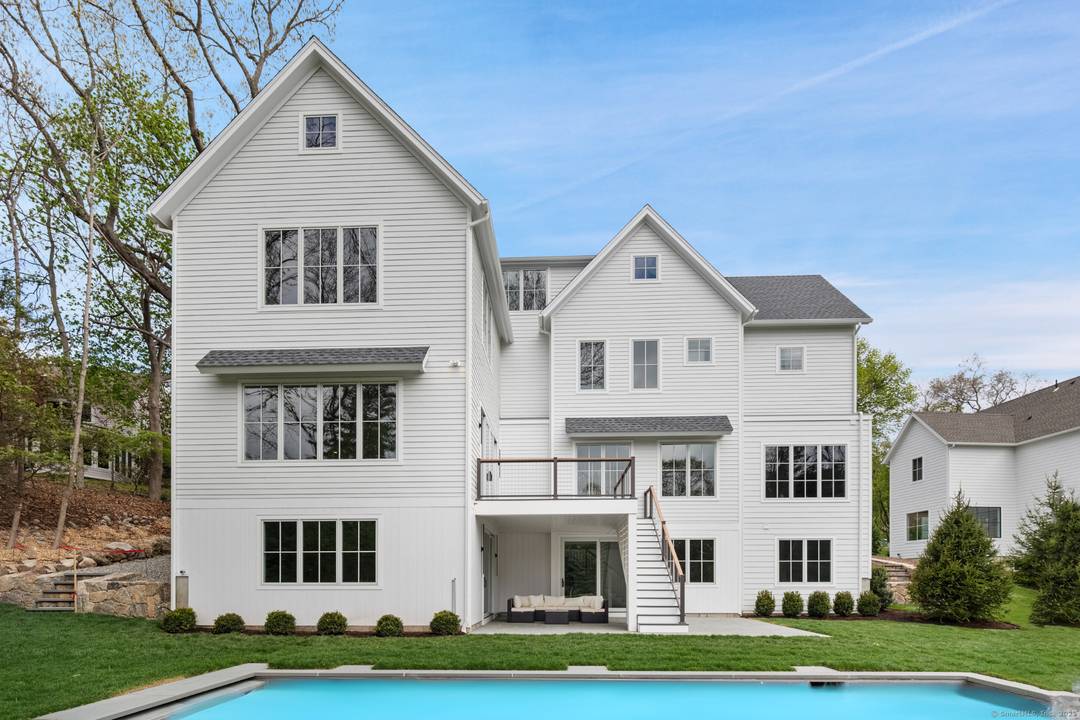 THE ESTATES AT COMPO SOUTH SIR Development presents the last of two luxury residences set back on beautiful property, each with their own distinct Modern style and pool.