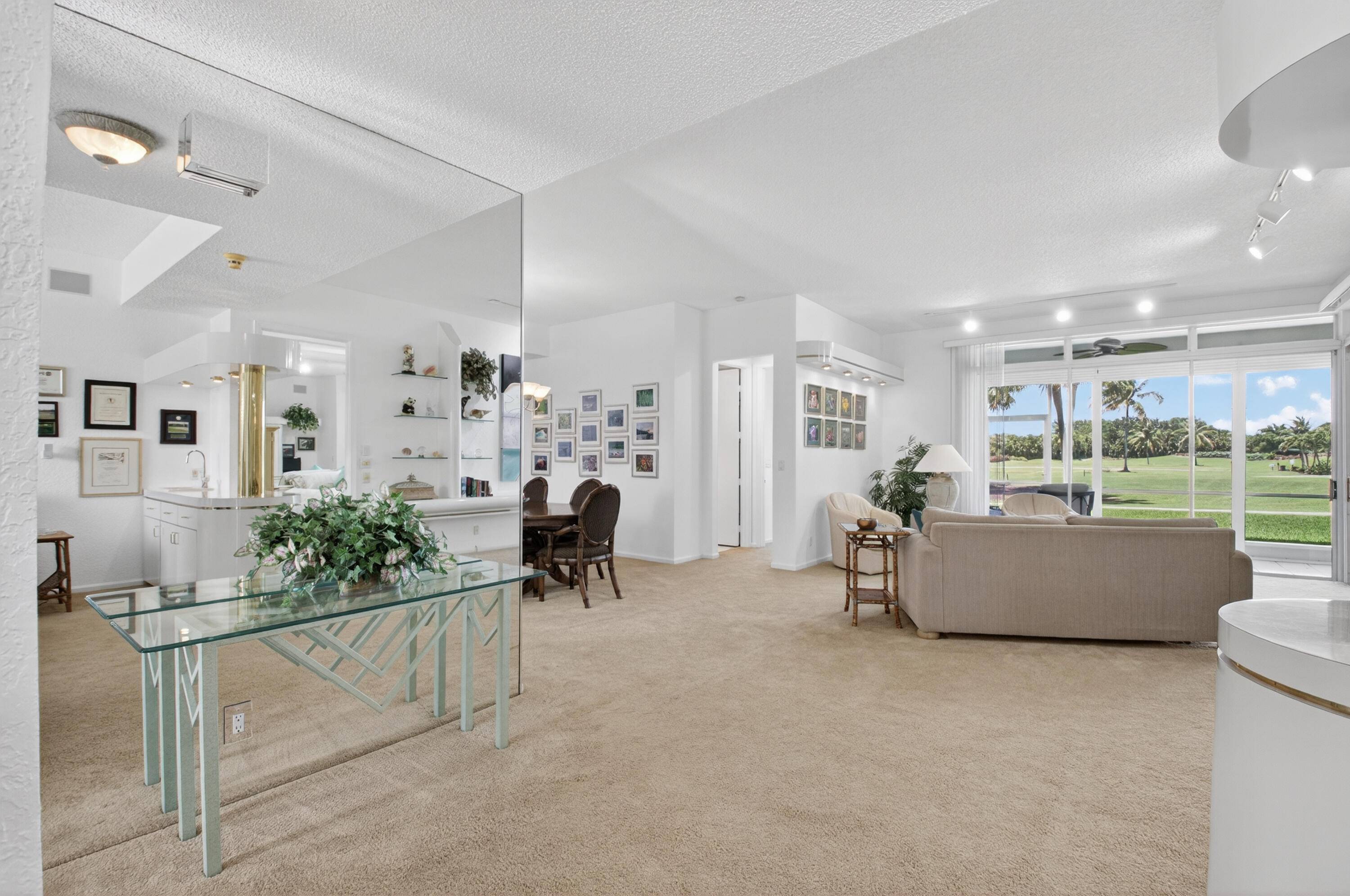 Stunning golf views from wrap around screen porch !