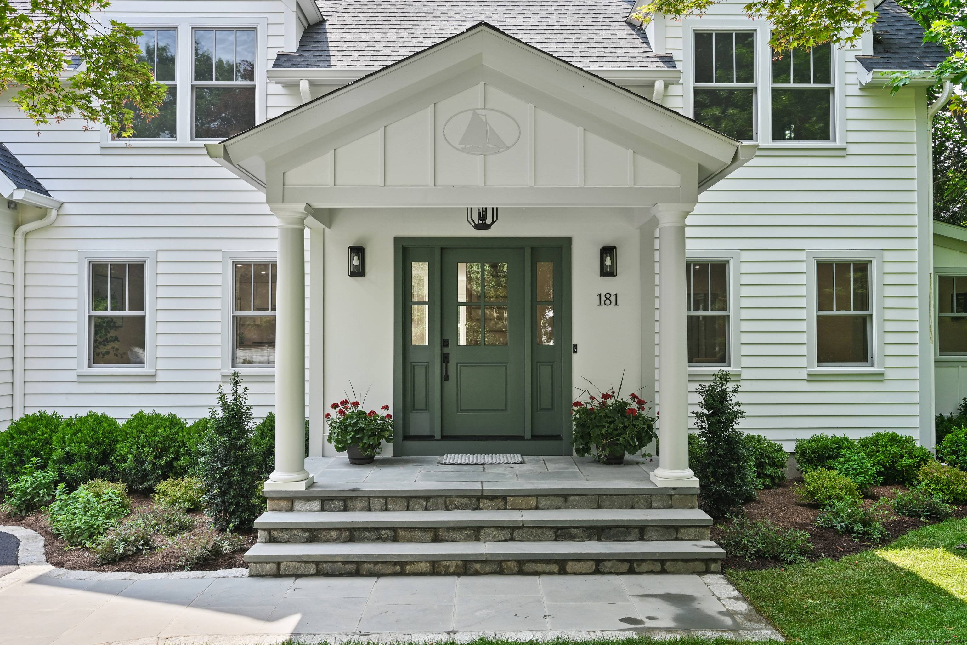 This architect designed home offers approximately 4, 250 square feet of living space with five bedrooms and three bathrooms.