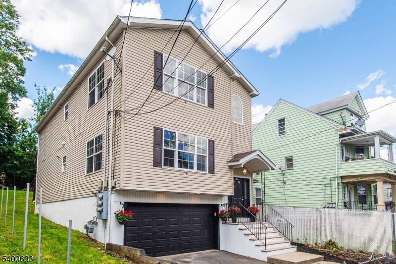 Discover this turnkey gem featuring two spacious units, each offering 3 bedrooms and 2 full bathrooms, PLUS a bonus 3 bedroom, 1 bath unit ideal for guests, and more.