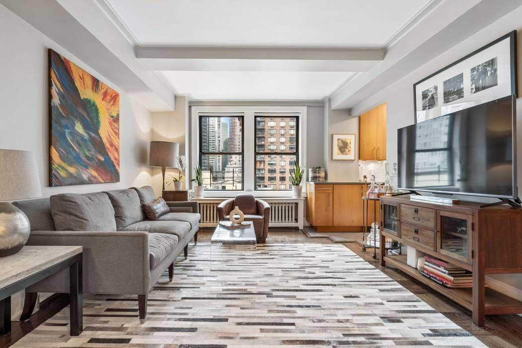 MODERN, CHIC ONE BEDROOM in COVETED PRE WAR Move right in to this bright, high floor renovated and modern one bedroom with Pre war details crown molding, beamed ceilings, and ...