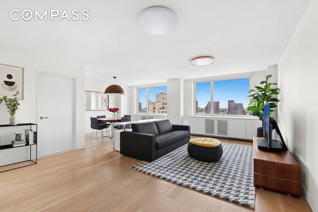 Welcome to 301 W 53rd St Unit 18A, a luxurious high floor corner residence in the heart of vibrant Hell s Kitchen.