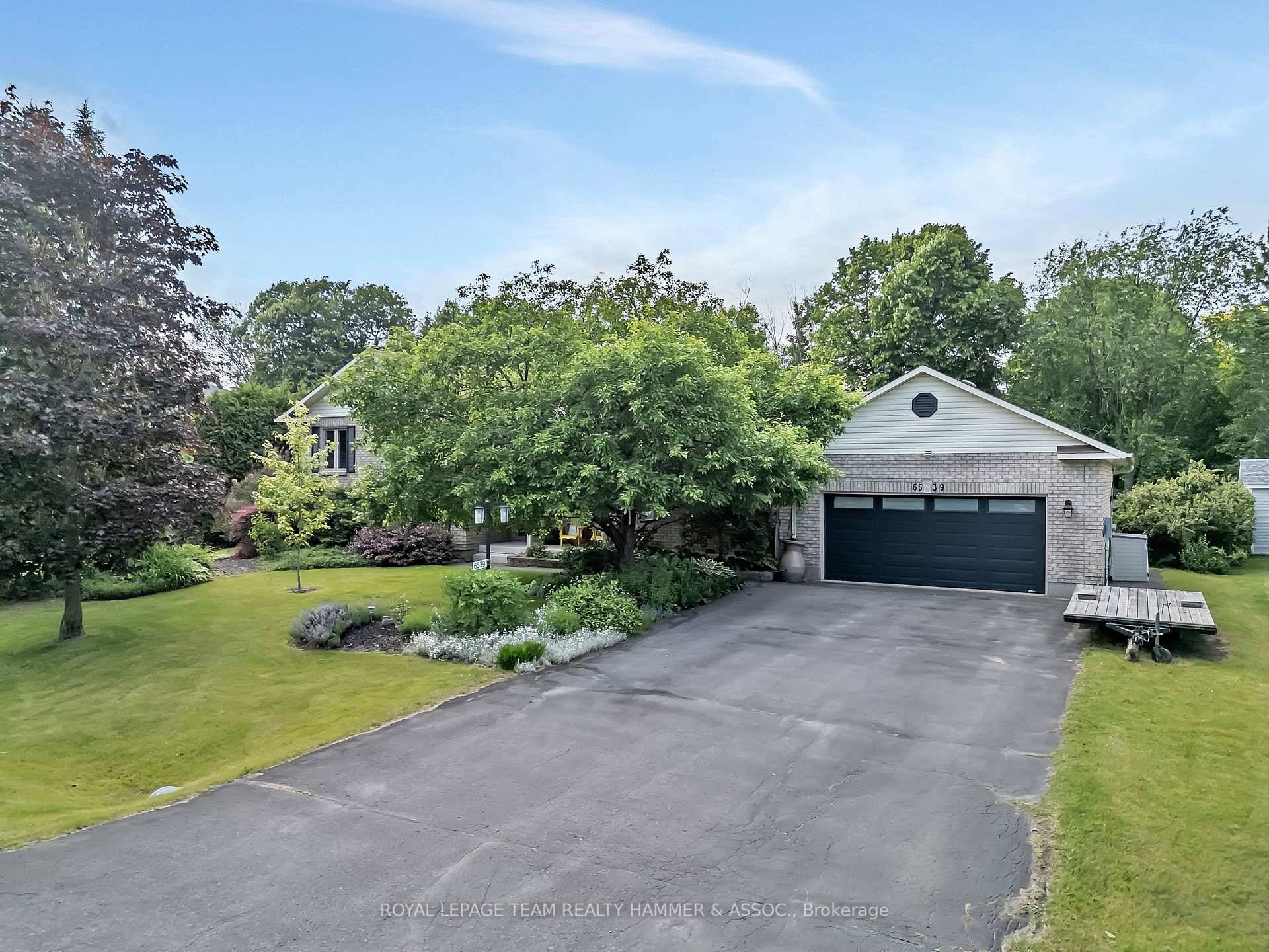 Beautifully maintained 3 1 bed, 3 bath side split blends timeless design with modern comfort.