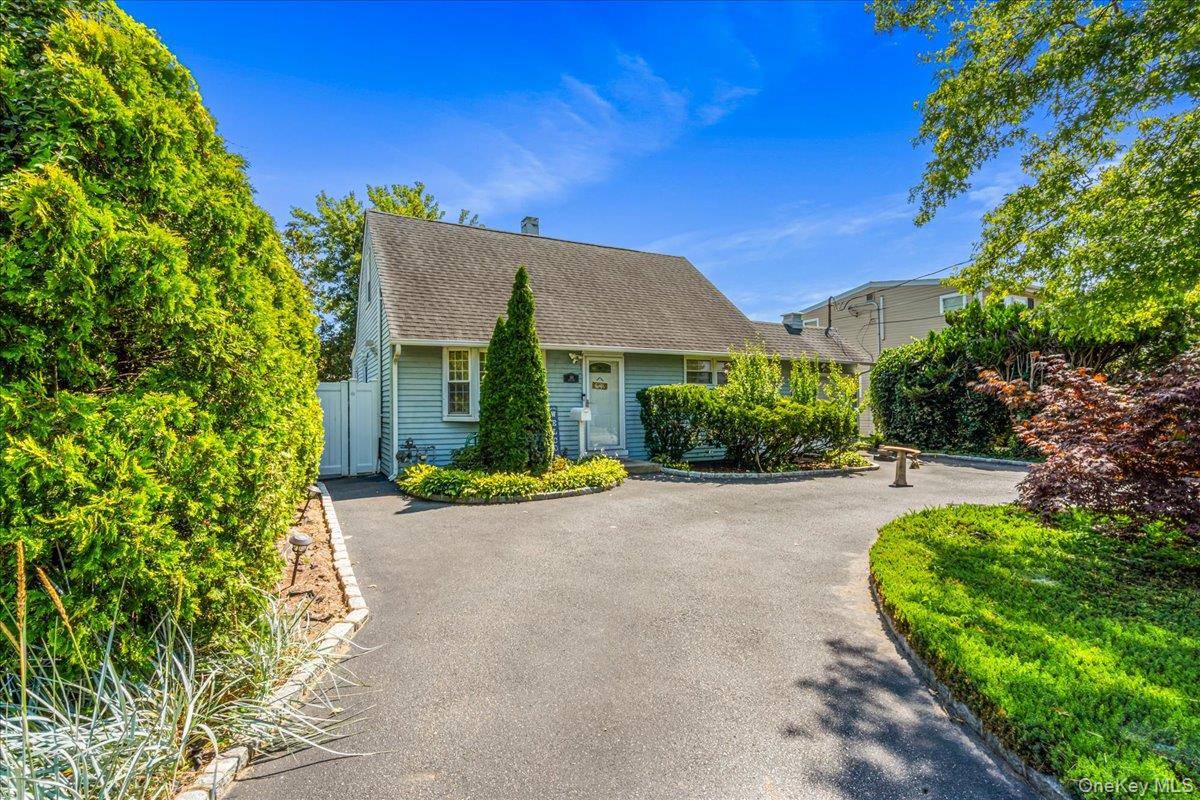 This beautifully updated expanded Cape offers 4 spacious bedrooms, an updated bathroom, and abundant storage throughout.