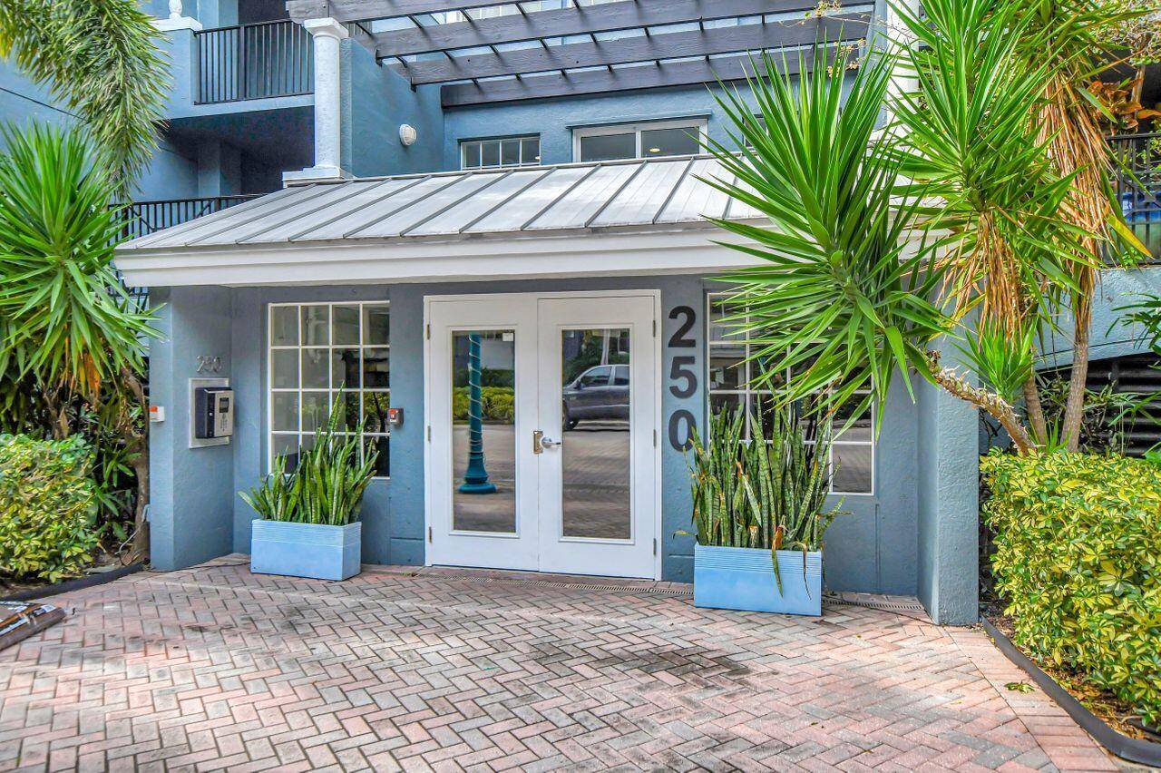This Beautiful 2 Bed 2 Bath condo in the heart of Delray's Pineapple Grove Community with a view of treelined 3rd Ave, clubhouse and pool from its balcony.