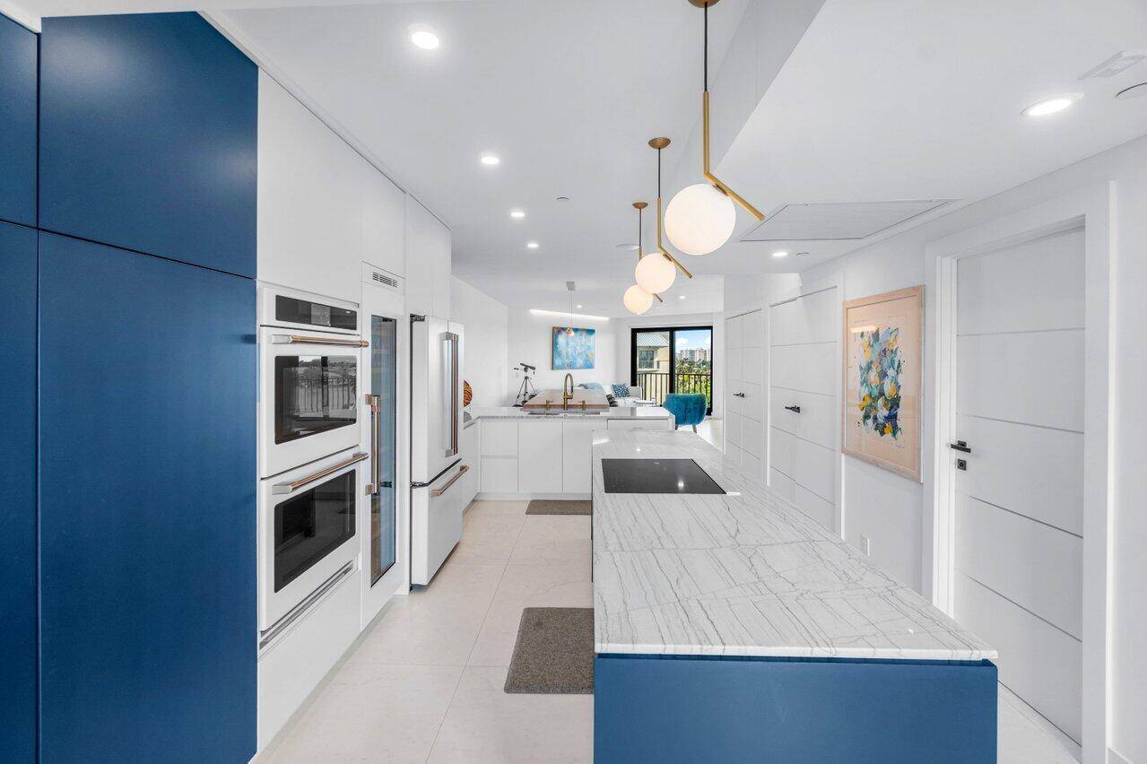 Fall in love with breathtaking water views from every room in this beautifully remodeled SE corner penthouse, located in the sought after Delray Harbor Club.