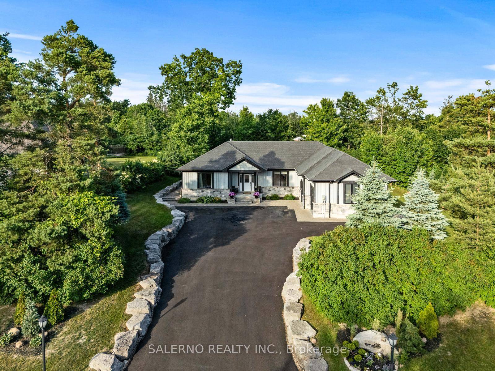 Welcome To 2065 Forest Valley Drive, A Rare Opportunity To Own A Custom Bungalow In An Enclave Of Executive Homes.