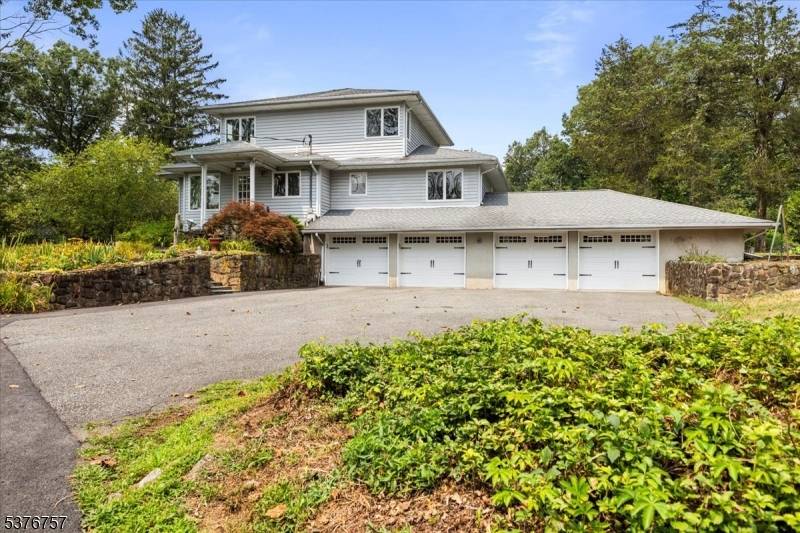 Bathed in natural light this custom home truly shines inside and out.