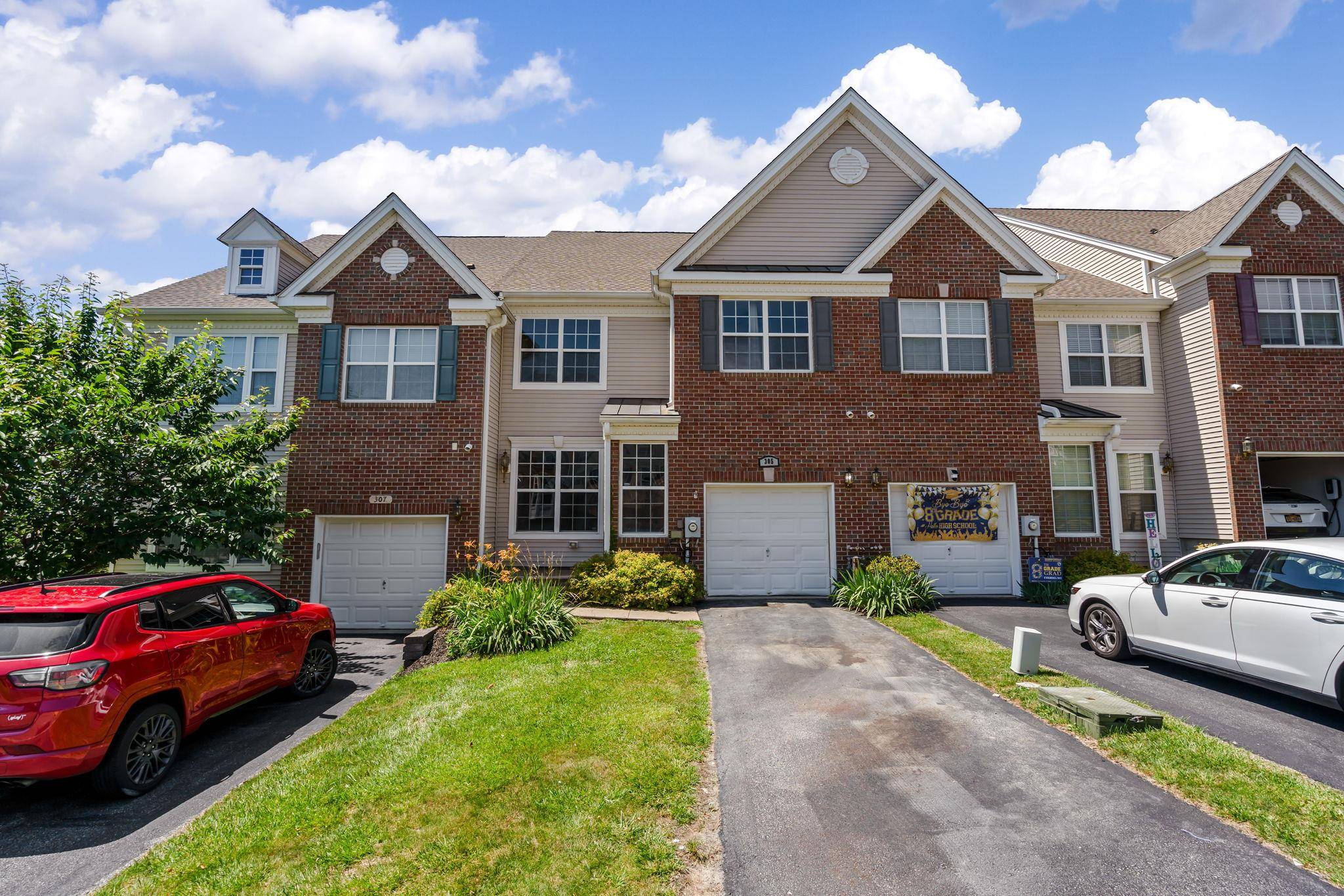 Welcome to 305 Balsam Drive, A Rare Gem at The Grove at New Windsor.
