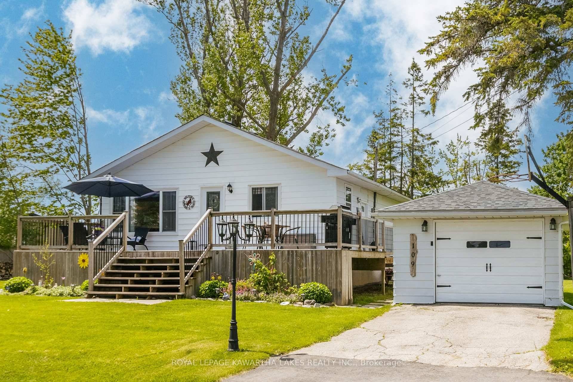 This pristine bungalow is overflowing with charm, and has access to Sturgeon Lake !