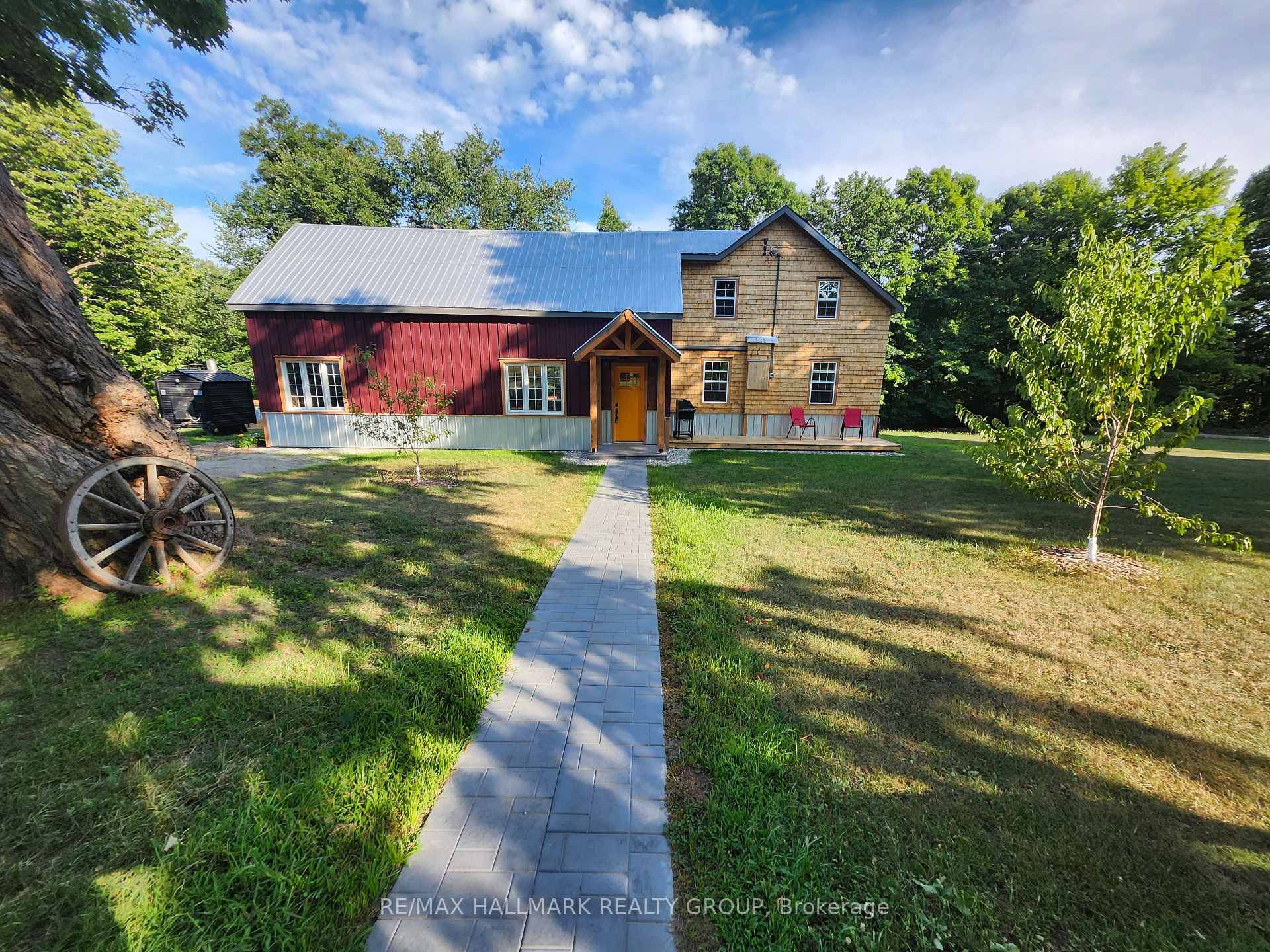 Welcome to this charming country retreat, nestled on over 6 acres of beautifully treed land just 5 minutes from Bellamy Lake.