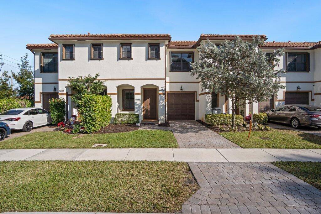 Immaculate 2017 Townhouse with Modern Features This almost new townhouse combines style and functionality, offering hurricane protection with accordion shutters and plantation shutters as elegant window blinds.