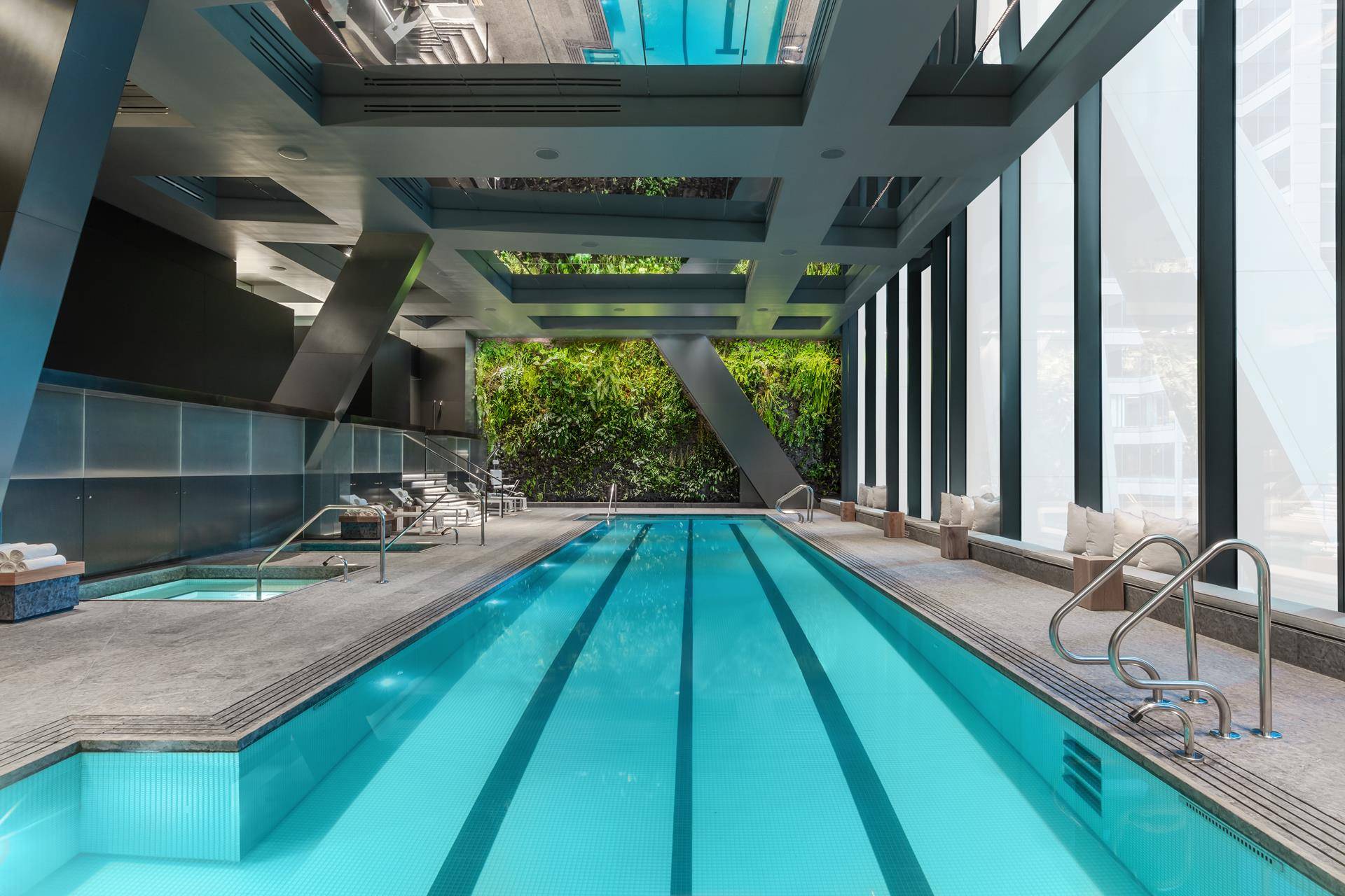 Duplex Residence 72B at 53 West 53 comprises 4, 216 square feet, offering three bedrooms, three and a half bathrooms, and south, north, east, and west facing exposures.