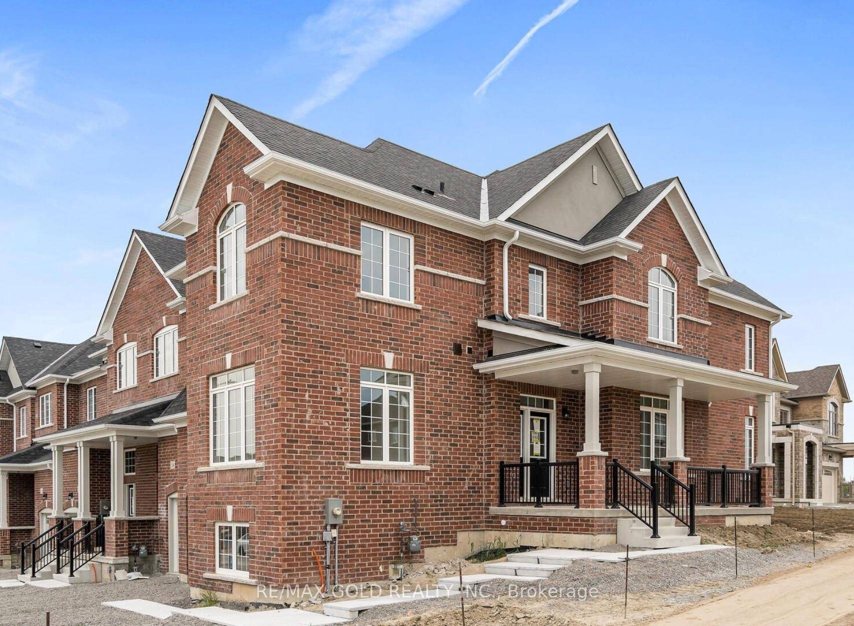 Spacious End Unit Freehold Townhome with Lookout Basement !