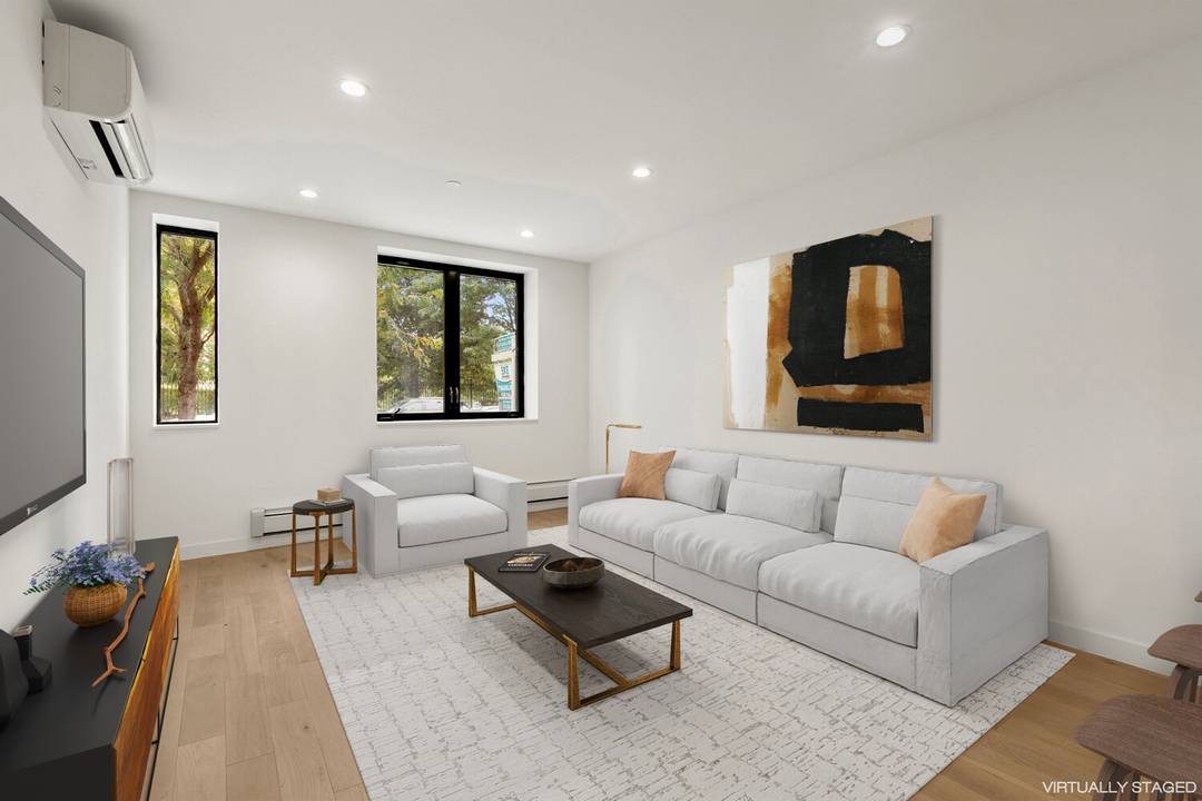 Stylish Duplex Living in Greenwood Heights Your Urban Fall Sanctuary Welcome home to this brand new modern duplex condo that marries sleek design with versatile spaces perfect for cozying in ...