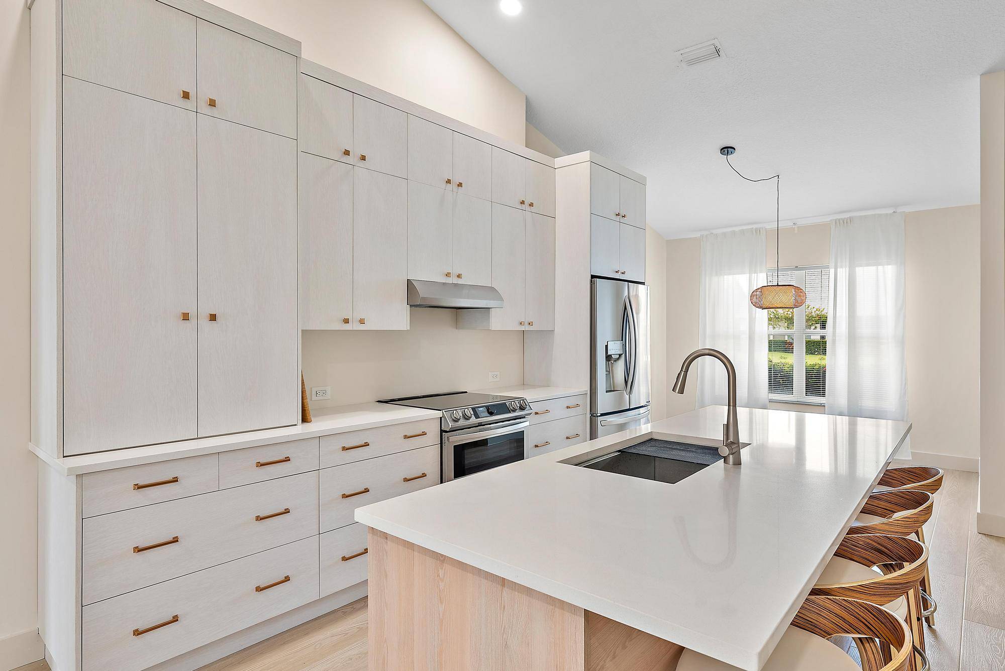 UPDATES GALORE ! ! ! Meticulously curated home features a newly renovated kitchen, quartz countertops and custom stacked cabinetry, 8 foot island equipped with a brand new Kraus Workstation sink, ...
