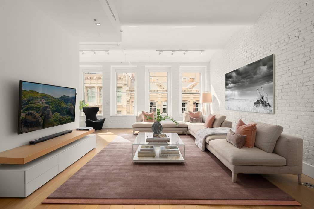 Impeccably Renovated Soho Loft with Timeless Character and Modern Luxury.