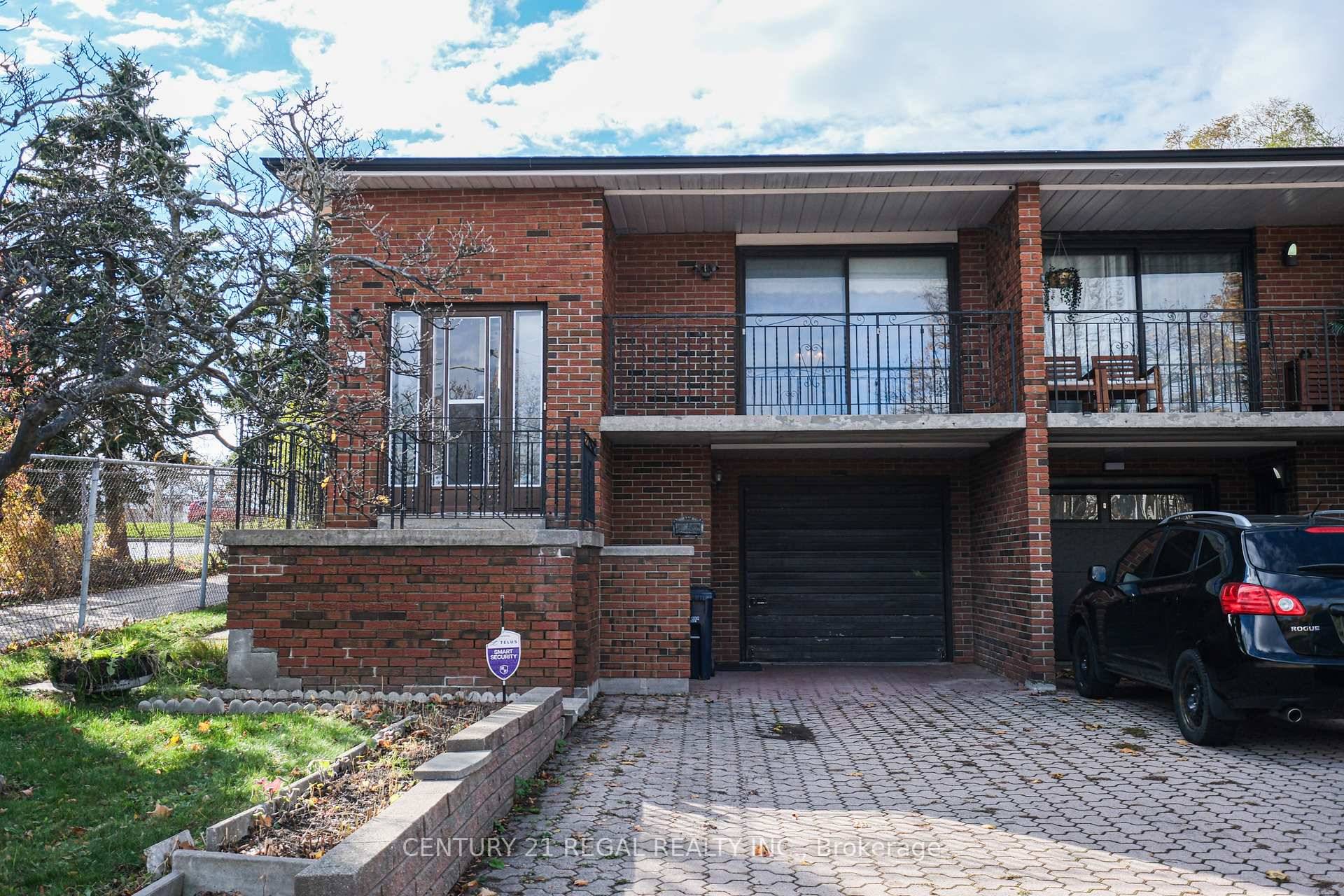 Welcome to this Solid 5 Level Backsplit Semi Detached Home This Large 4 Bedroom Home includes 2 Full Kitchens, 2 Full Bathrooms, and 2 Fireplaces Potential for Rental Income.