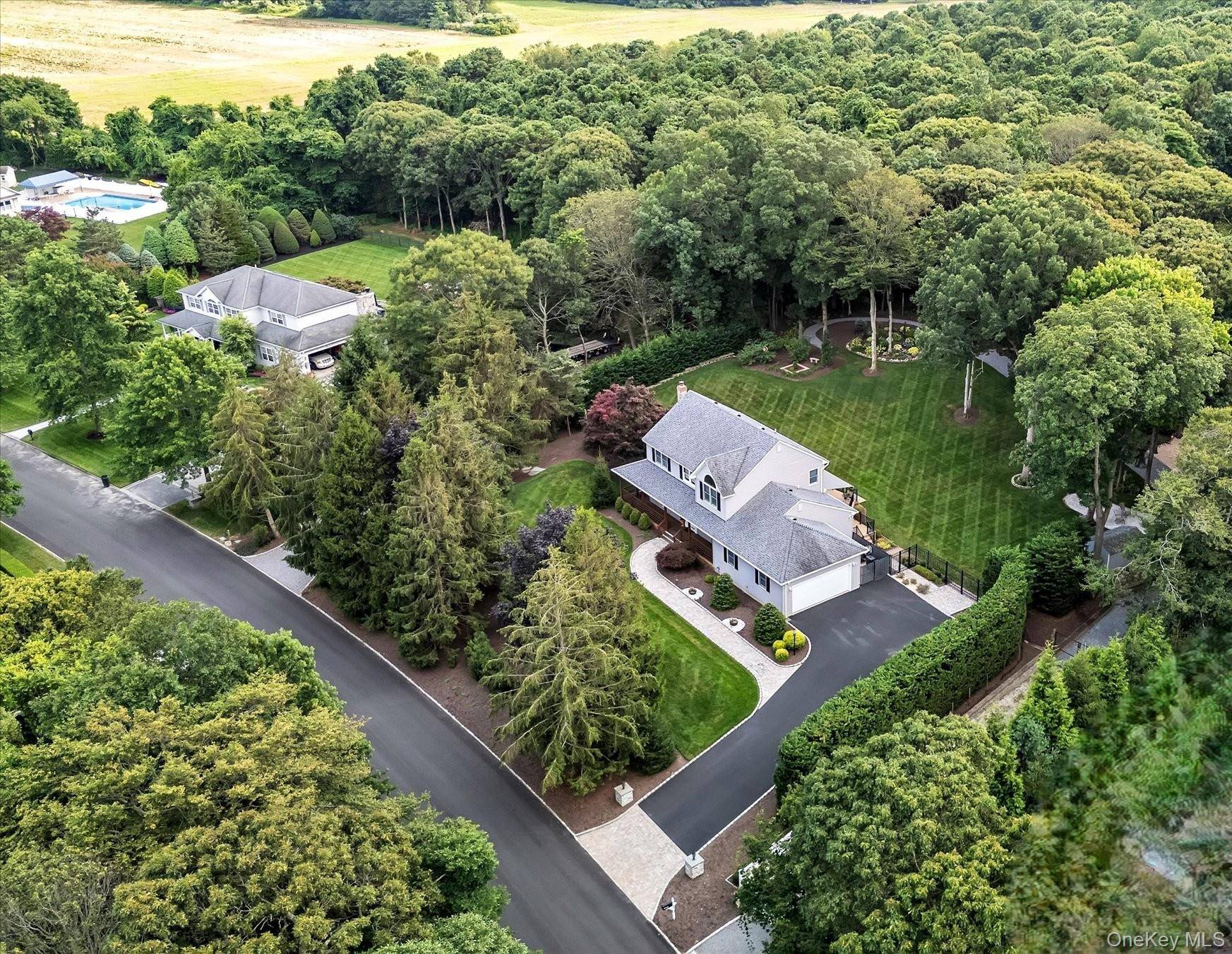 Nestled within Baiting Hollow Estates on Long Island's North Fork, this well maintained home offers the perfect blend of comfort, privacy, and coastal living.